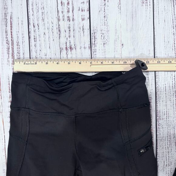 lululemon Black High Rise Crop Leggings Size 4 Zip Pocket 17” Inseam - Picture 5 of 7